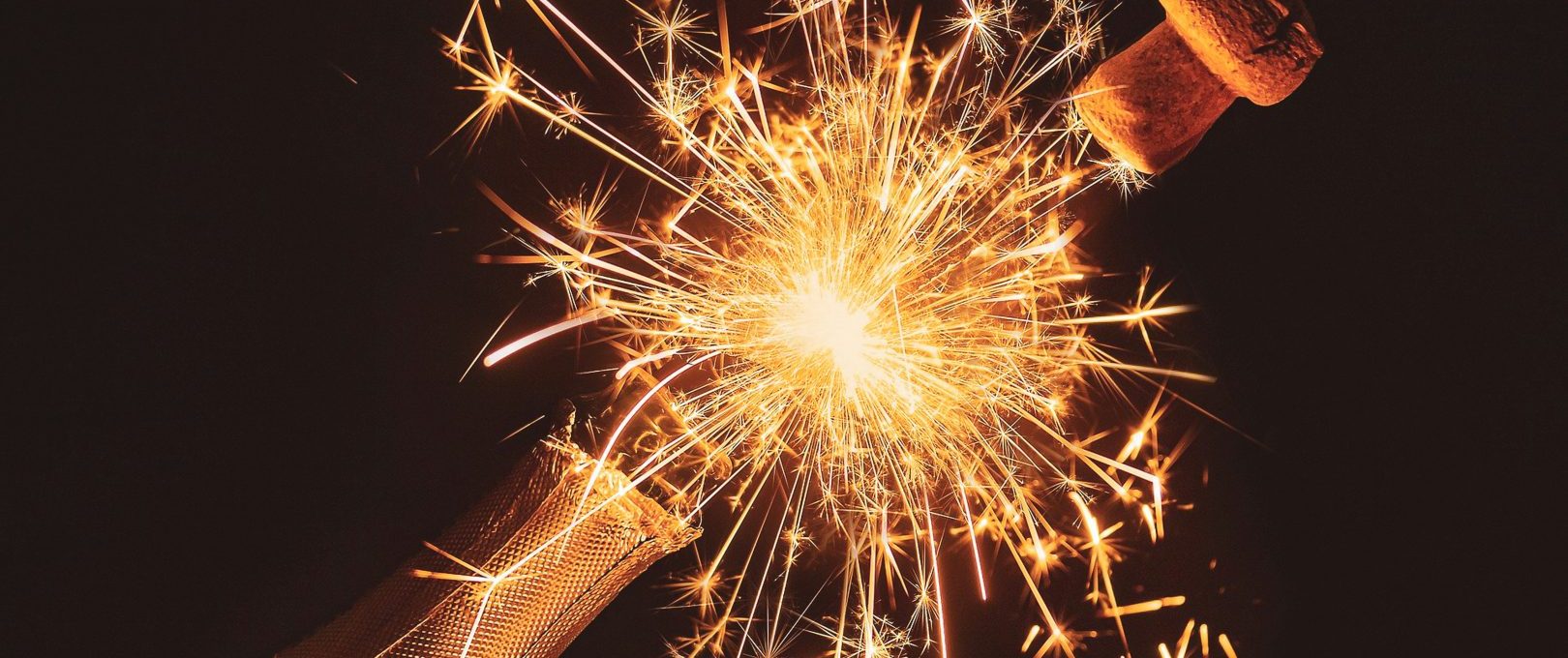 a bottle of champagne with sparklers at The Jerome